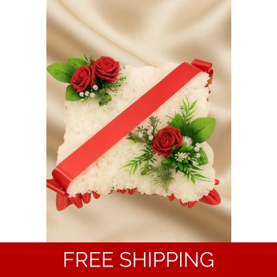 "Red cushion Funeral Tribute with Artificial Roses – Elegant Memorial Cushion Arrangement"